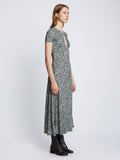 Side full length image of model wearing Slinky Jersey Keyhole Dress in BLACK/WHITE/JADE