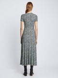 Back full length image of model wearing Slinky Jersey Keyhole Dress in BLACK/WHITE/JADE