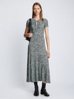 Front full length image of model wearing Slinky Jersey Keyhole Dress in BLACK/WHITE/JADE with keyhole fastened