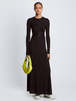 Front full length image of model wearing Long Sleeve Jersey Open Back Dress in BLACK