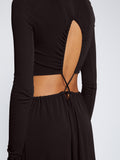 Detail image of model wearing Long Sleeve Jersey Open Back Dress in BLACK