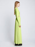 Side full length image of model wearing Long Sleeve Jersey Open Back Dress in LIME