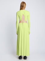 Back full length image of model wearing Long Sleeve Jersey Open Back Dress in LIME