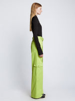 Side full length image of model wearing Long Sleeve Jersey Keyhole Top in BLACK
