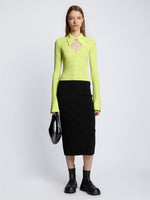 Front full length image of model wearing Long Sleeve Jersey Keyhole Top in LIME