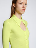 Detail image of model wearing Long Sleeve Jersey Keyhole Top in LIME