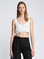 Front cropped image of model wearing Ribbed Cotton Cropped Sweater in OFF WHITE