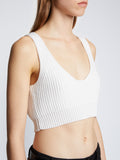 Detail image of model wearing Ribbed Cotton Cropped Sweater in OFF WHITE