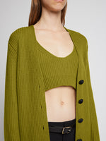 Detail image of model wearing Ribbed Cotton Relaxed Cardigan in LEAF 