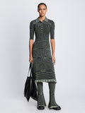 Front full length image of model wearing Space Dye Rib Knit Polo Dress styled over Space Dye Rib Knit Pant in NAVY/LIME/BLACK