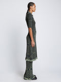 Side full length image of model wearing Space Dye Rib Knit Polo Dress in NAVY/LIME/BLACK