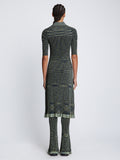 Back full length image of model wearing Space Dye Rib Knit Polo Dress in NAVY/LIME/BLACK