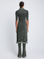 Back full length image of model wearing Space Dye Rib Knit Polo Dress in NAVY/LIME/BLACK
