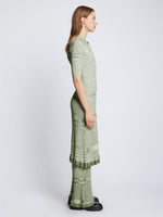 Side full length image of model wearing Space Dye Rib Knit Polo Dress in NAVY/LIME/WHITE