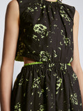 Detail image of model wearing Poplin Cut Out Midi Dress in BLACK/LIME