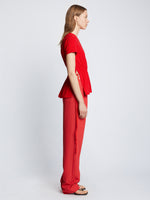 Side full length image of model wearing Ruched Side Tie T-Shirt in CHERRY