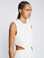 Detail image of model wearing Poplin Cut Out Midi Dress in OFF WHITE