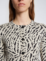 Detail image of model wearing Animal Jacquard Cardigan in BEIGE/BLACK