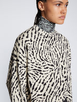 Detail image of model wearing Animal Jacquard Sweater in BEIGE/BLACK