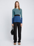 Front full length image of model wearing Slinky Stripe Long Sleeve Sweater in AQUA/BLACK/OXFORD BLUE untucked