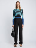 Front full length image of model wearing Slinky Stripe Long Sleeve Sweater in AQUA/BLACK/OXFORD BLUE tucked in