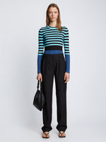 Front full length image of model wearing Slinky Stripe Long Sleeve Sweater in AQUA/BLACK/OXFORD BLUE tucked in