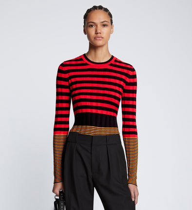 Front cropped image of model wearing Slinky Stripe Long Sleeve Sweater in CHERRY/GOLDEN ROD/BLACK
