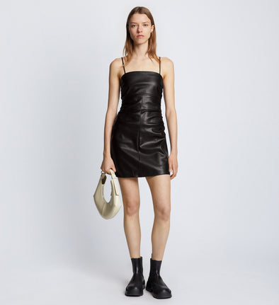 Front full length image of model wearing Faux Leather Ruched Mini Dress in BLACK