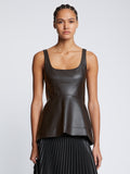 Front cropped image of model wearing Faux Leather Bustier Top in BLACK