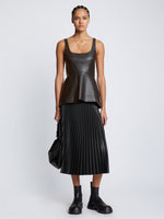Front full length image of model wearing Faux Leather Bustier Top in BLACK