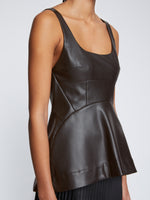 Detail image of model wearing Faux Leather Bustier Top in BLACK