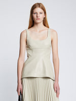 Front cropped image of model wearing Faux Leather Bustier Top in CHALK
