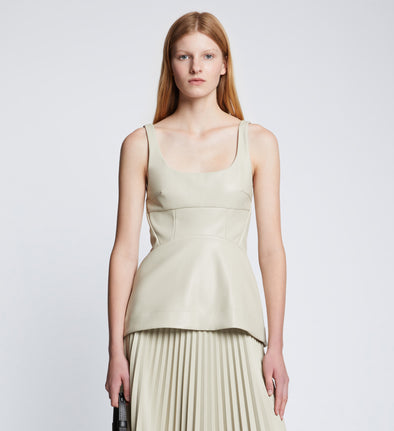 Front cropped image of model wearing Faux Leather Bustier Top in CHALK