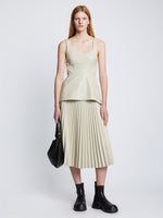 Front full length image of model wearing Faux Leather Bustier Top in CHALK