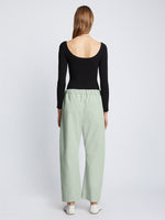 Back full length image of model wearing Solid Cotton Linen Easy Pants in LIGHT SEAFOAM