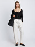 Front full length image of model wearing Solid Cotton Linen Easy Pants in OFF WHITE