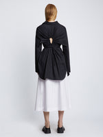 Back full length image of model wearing Soft Poplin Button Down Shirt Dress in BLACK