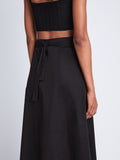 Detail image of model wearing Soft Poplin Wrap Skirt in BLACK