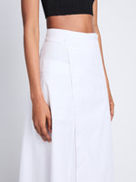 Detail image of model wearing Soft Poplin Wrap Skirt in OFF WHITE