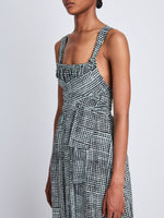 Detail image of model wearing Viscose Flou Wrap Dress in BLACK/PAPER MINT