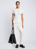 Front full length image of model wearing Ruched Side Tie T-Shirt in OFF WHITE