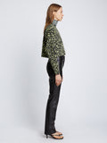 Side full length image of model wearing Animal Jacquard Sweater in BLACK/LIME