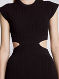 Detail image of model wearing Pointelle Rib Cut Out Knit Dress in BLACK