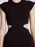 Detail image of model wearing Pointelle Rib Cut Out Knit Dress in BLACK