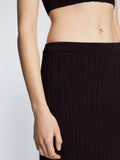 Detail image of model wearing Pointelle Rib Knit Skirt in BLACK
