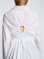 Detail image of model wearing Soft Poplin Button Down Shirt Dress in OFF WHITE