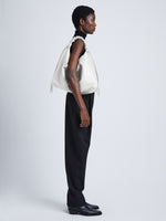 Image of model wearing Large Drawstring Shoulder Bag in OPTIC WHITE