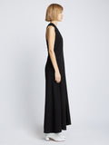 Side full length image of model wearing Matte Crepe Twist Back V-Neck Dress in BLACK