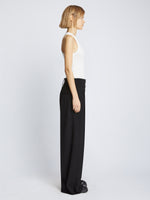 Side full length image of model wearing Matte Viscose Crepe Pants in BLACK