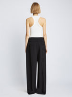 Back full length image of model wearing Matte Viscose Crepe Pants in BLACK